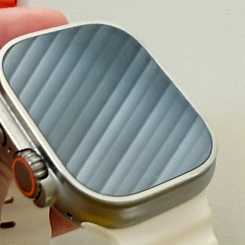 Apple Watch Ultra 1st Gen Smartwatch with White, Orange, and Yellow Bands